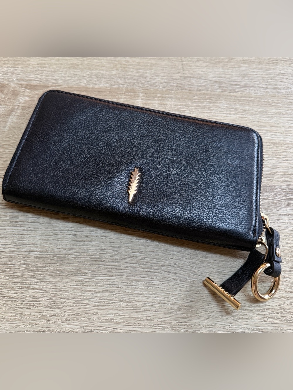 Thacker Black Leather Zip-Around Wallet with Gold Hardware